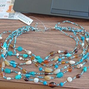 Beaded necklace. NWT. 7 strands, 10"-23" drop